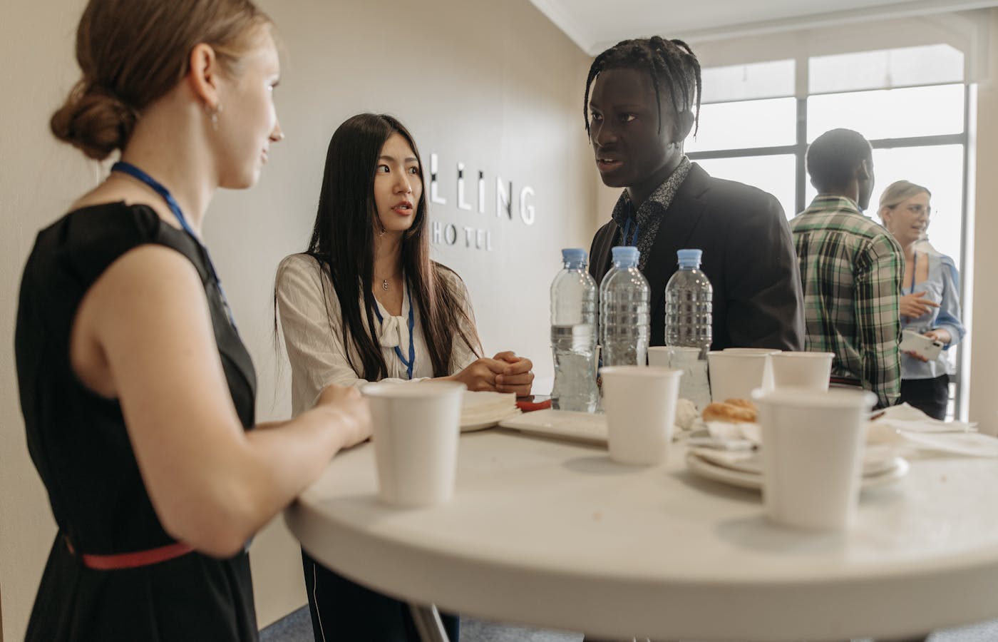 Professionals networking at a business event